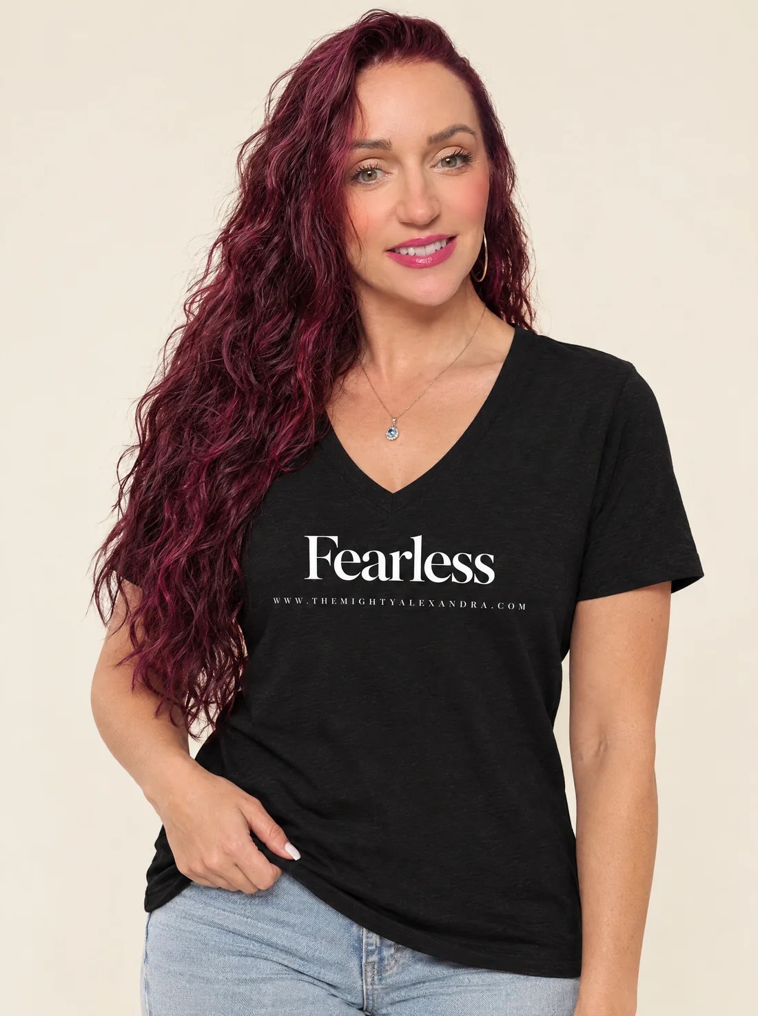 Alexandra wearing the black Fearless V-neck tee